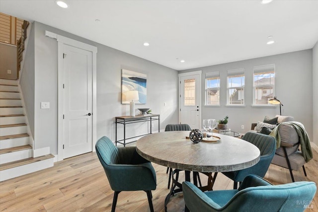 dining room with light hardwood / wood-style flooring