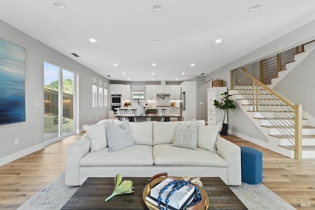 living room featuring light wood-type flooring