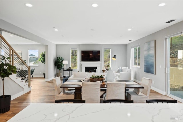 dining area featuring light wood-type flooring