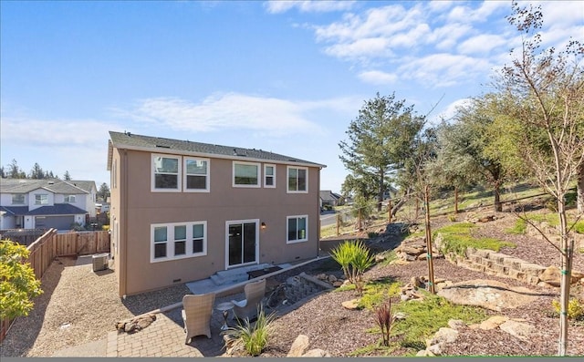 view of front of house with a patio and central air condition unit