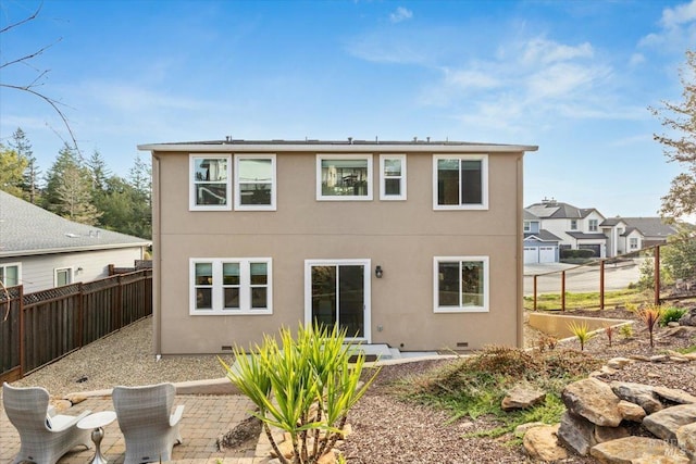 back of property with a patio area