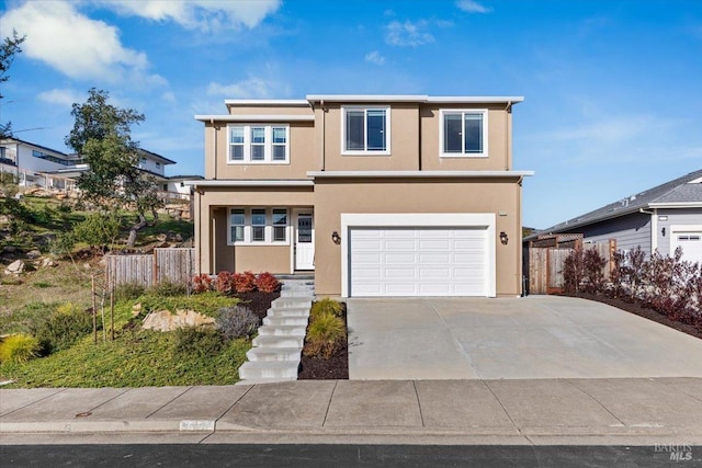 view of front of home with a garage