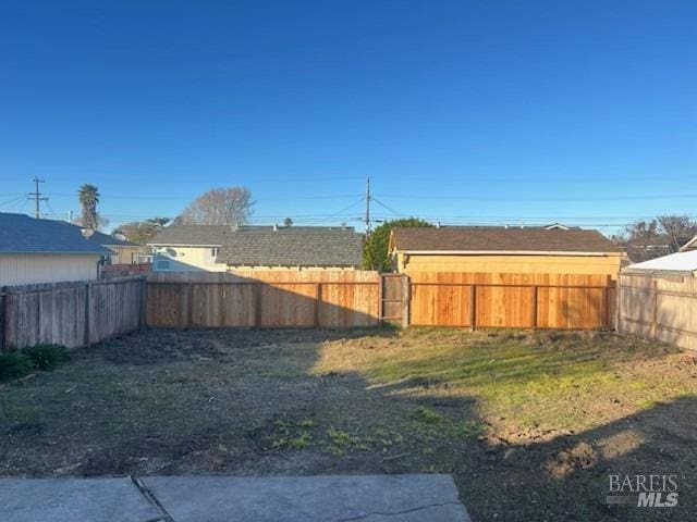view of yard featuring a fenced backyard