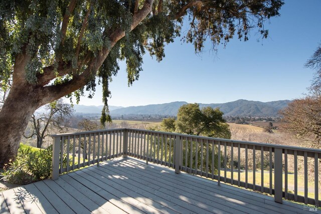 deck featuring a mountain view