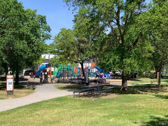 view of playground featuring a lawn