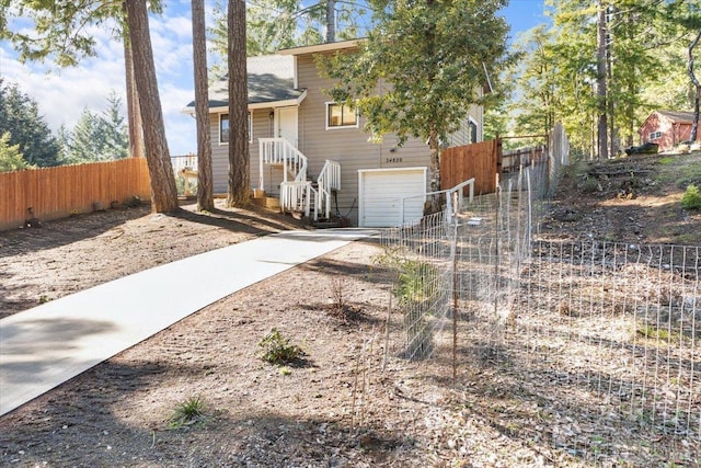 exterior space with a garage