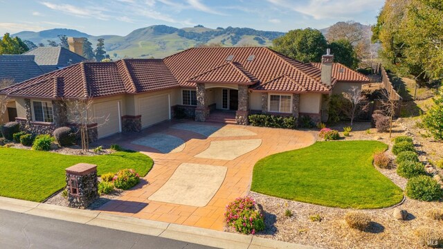 exterior space featuring a mountain view