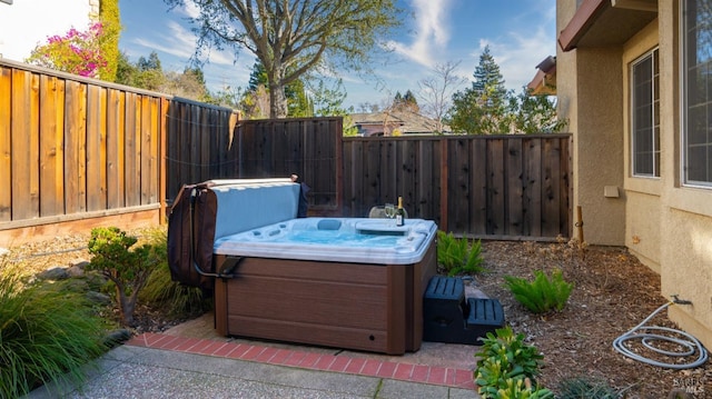 view of patio featuring a hot tub