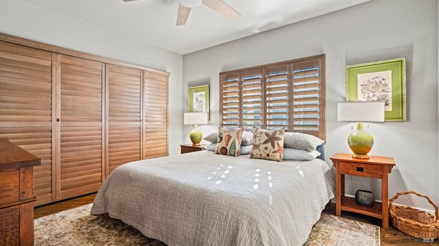 bedroom featuring ceiling fan and wood-type flooring