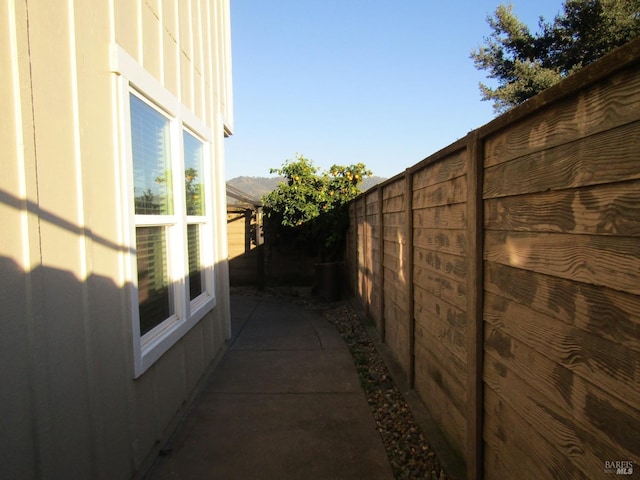 view of side of property featuring a patio