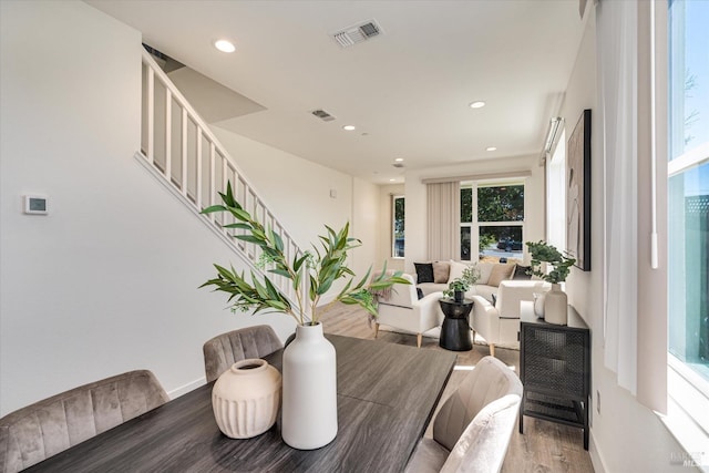 dining area featuring hardwood / wood-style flooring