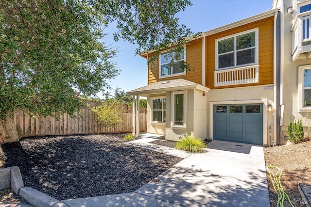 view of front of property featuring a garage