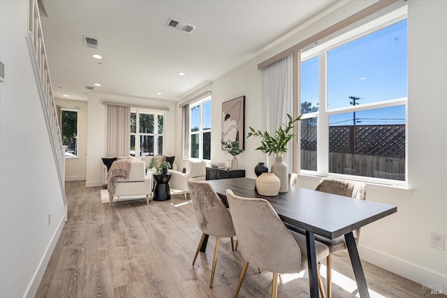 dining area featuring light hardwood / wood-style floors