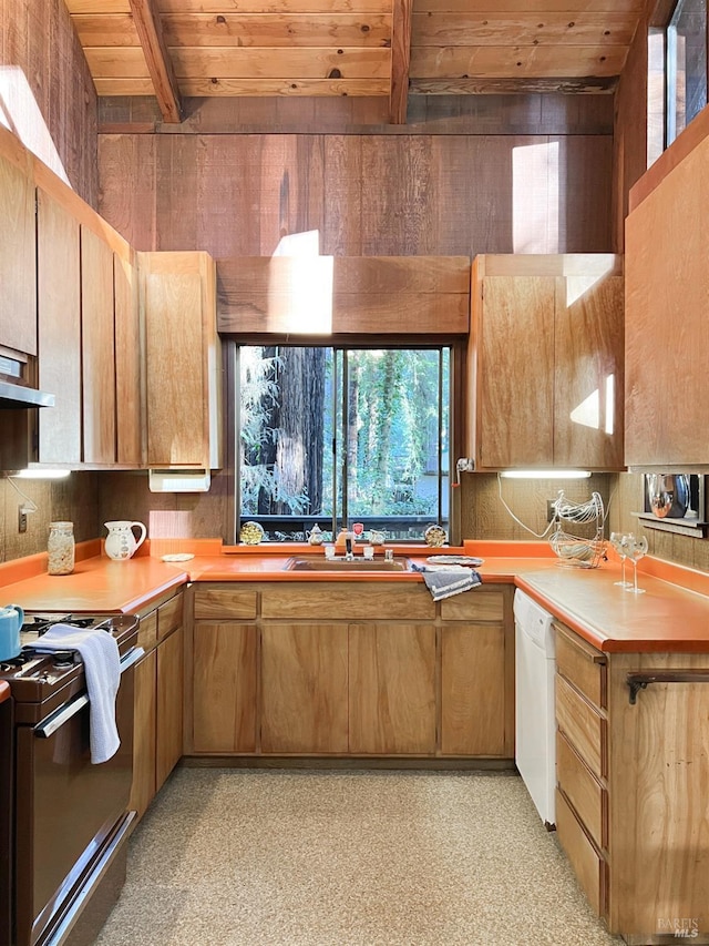 kitchen with range with gas cooktop, dishwasher, wood walls, wooden ceiling, and beam ceiling