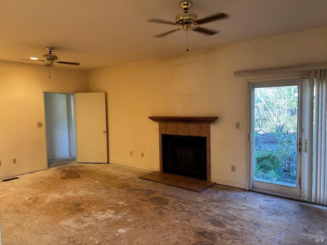 unfurnished living room with ceiling fan