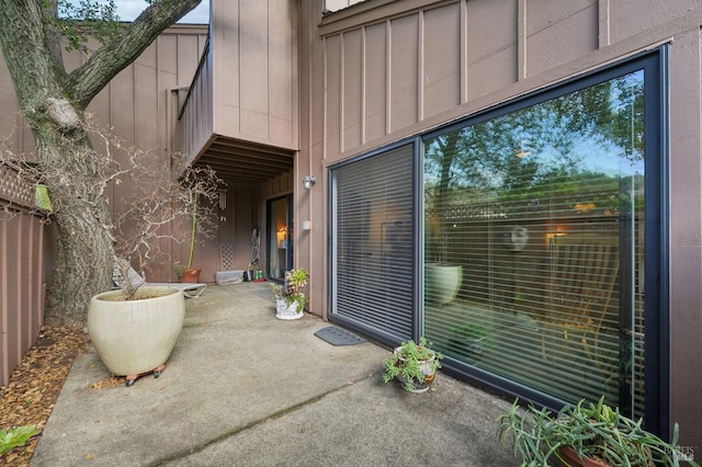 doorway to property featuring a patio