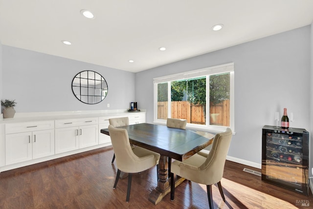 dining room with dark wood-type flooring