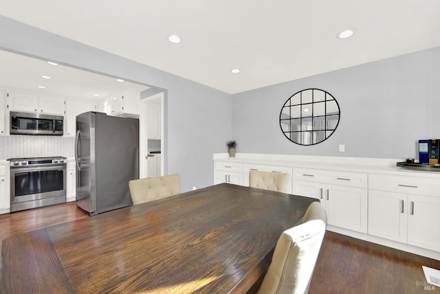 dining room featuring dark hardwood / wood-style floors