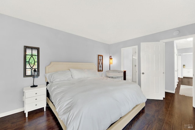 bedroom featuring dark hardwood / wood-style floors