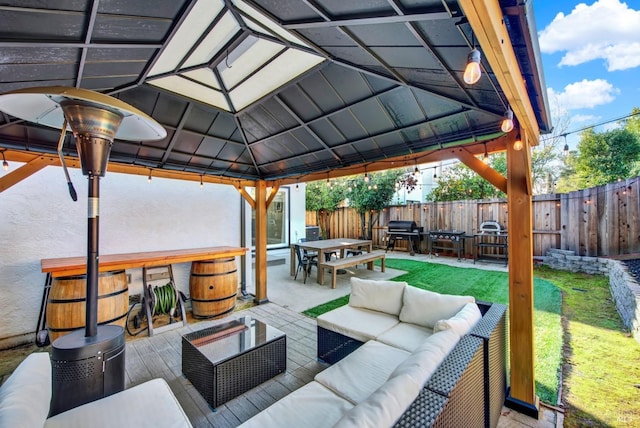 view of patio / terrace with a gazebo and outdoor lounge area