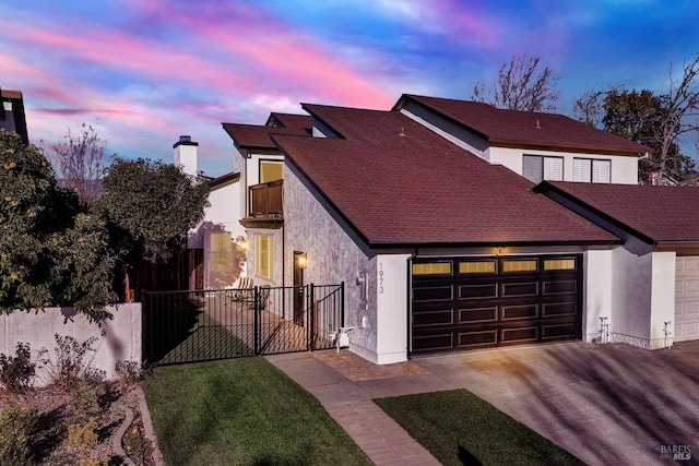 view of front of property featuring a garage