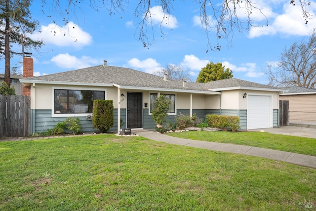 ranch-style house with a front lawn and a garage