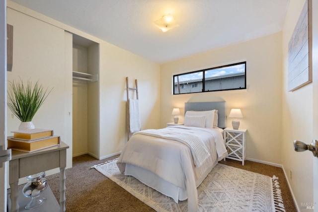 carpeted bedroom with a closet