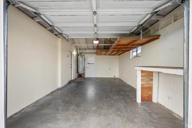 garage featuring secured water heater