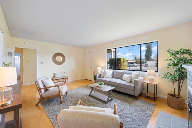 living room with light hardwood / wood-style flooring