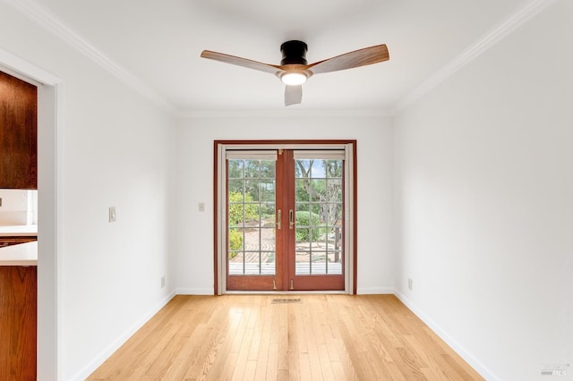 doorway to outside with crown molding, ceiling fan, french doors, and light wood-type flooring