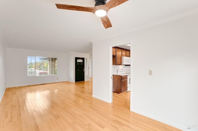 unfurnished living room with ceiling fan and light hardwood / wood-style floors