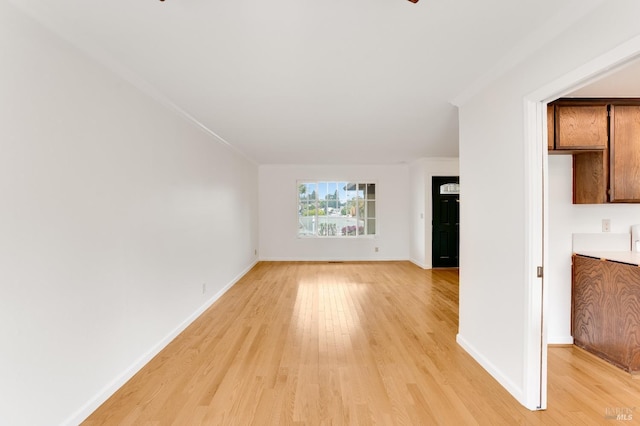 unfurnished living room with light hardwood / wood-style floors