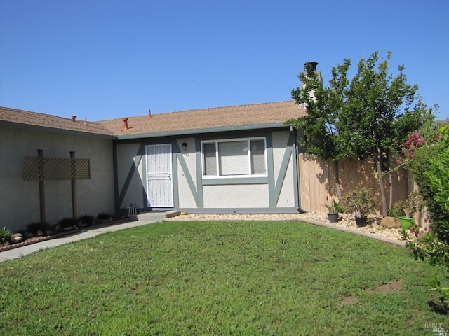 exterior space featuring a front lawn