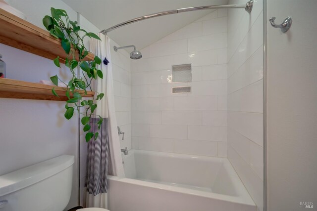 full bathroom featuring toilet, vanity, and shower / bath combo with shower curtain