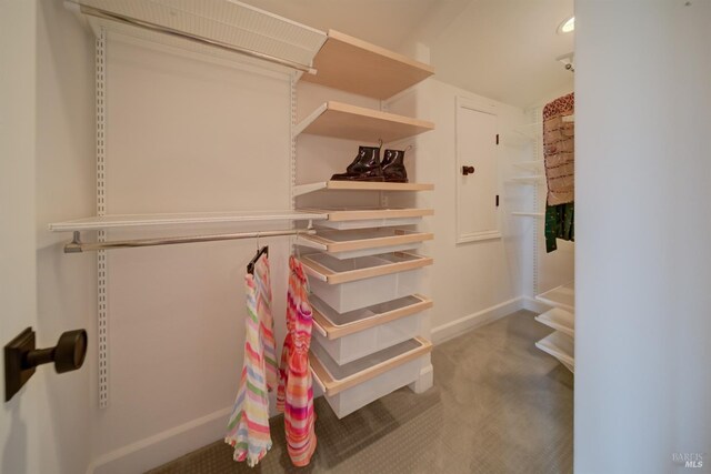 clothes washing area featuring cabinets, light parquet flooring, and sink