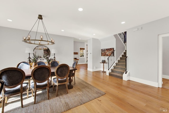 dining area with light hardwood / wood-style floors