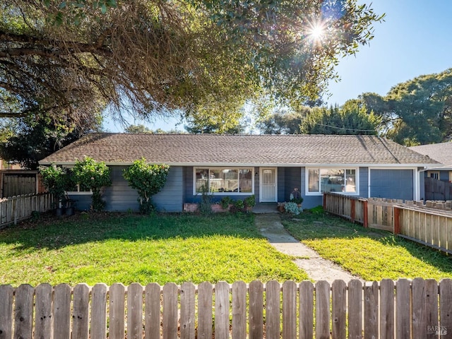 ranch-style home featuring a front lawn