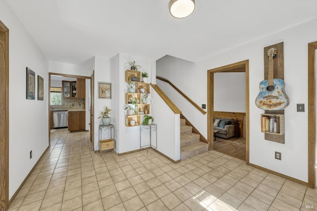 hallway featuring light tile patterned flooring