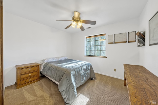 bedroom with light carpet and ceiling fan