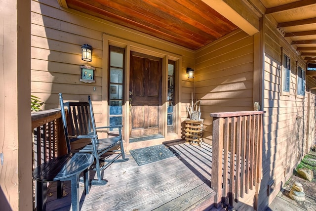 entrance to property with a porch