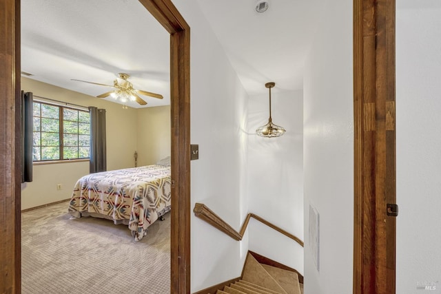 bedroom featuring ceiling fan and carpet floors