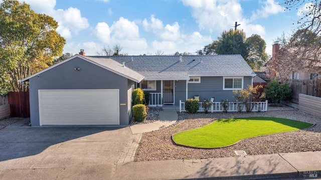 single story home with a garage