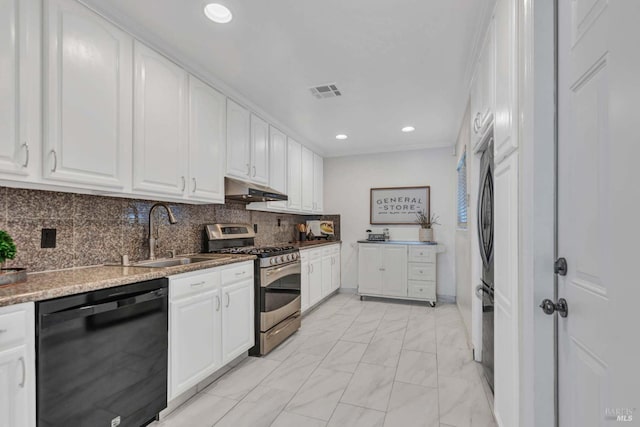 kitchen with black dishwasher, gas stove, and white cabinetry