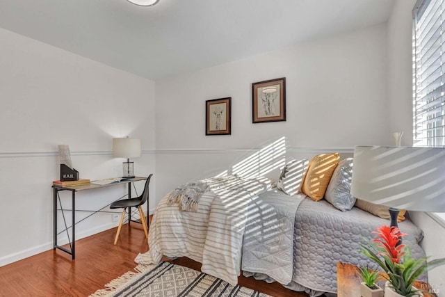 bedroom featuring hardwood / wood-style flooring