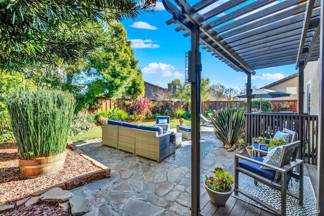 view of patio featuring outdoor lounge area and a pergola