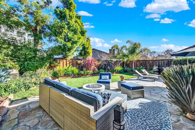 view of patio with a fire pit