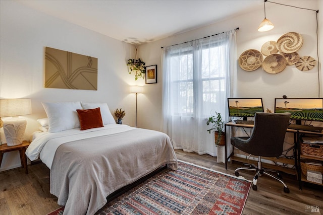 bedroom featuring hardwood / wood-style floors