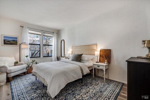 bedroom with wood-type flooring