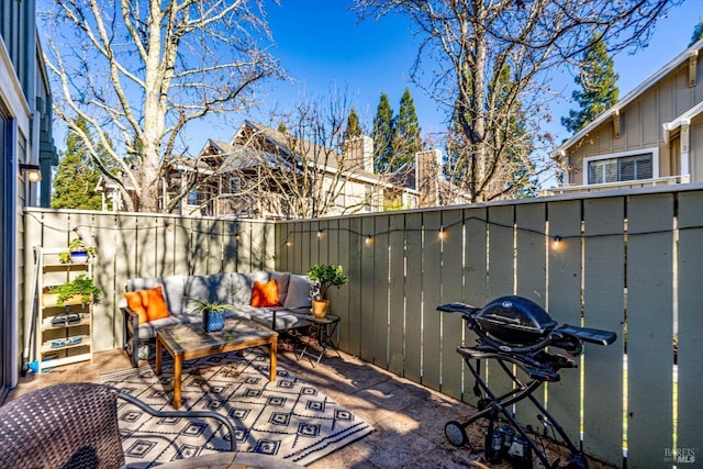 view of patio featuring grilling area and an outdoor hangout area