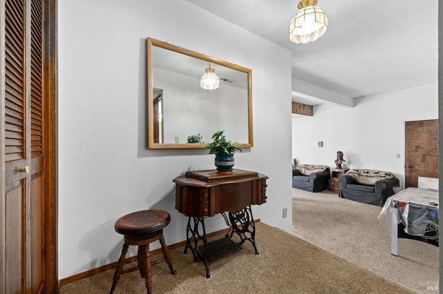 interior space featuring carpet flooring and beamed ceiling